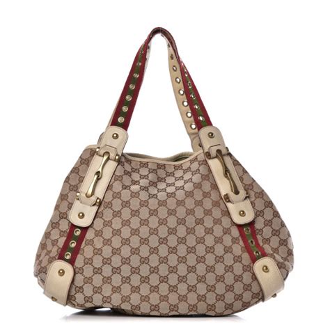 gucci purse grommet